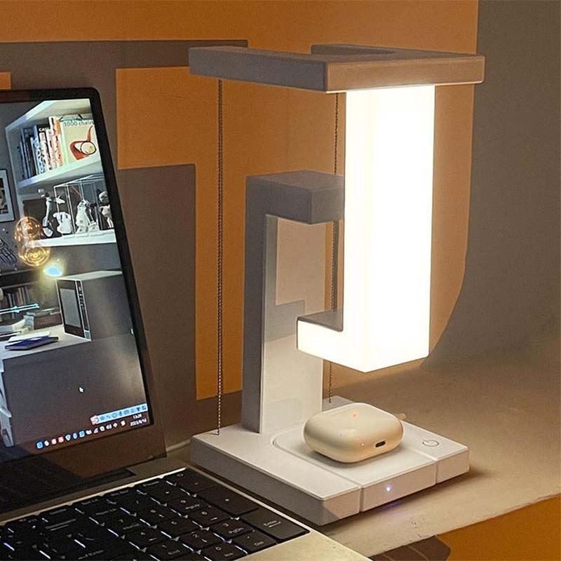 Creative Floating Cell Phone Wireless Charging Table Lamp